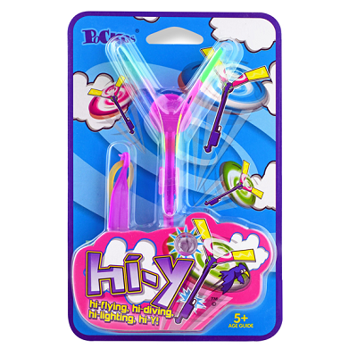 Hi-Y retail packaging. The Hi-Y is a y-shaped plastic propeller toy that spins in the air when launched with a rubber band. Text advertises: "hi-flying, hi-diving, hi-lighting, hi-Y!"