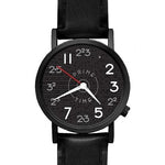 Load image into Gallery viewer, Black watch with prime numbers making up the watch face and black leather band
