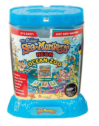A rectangular plastic container with a printed graphic advertising The Original Sea Monkeys: Neon Ocean-Zoo, the World's Only Instant Pets
